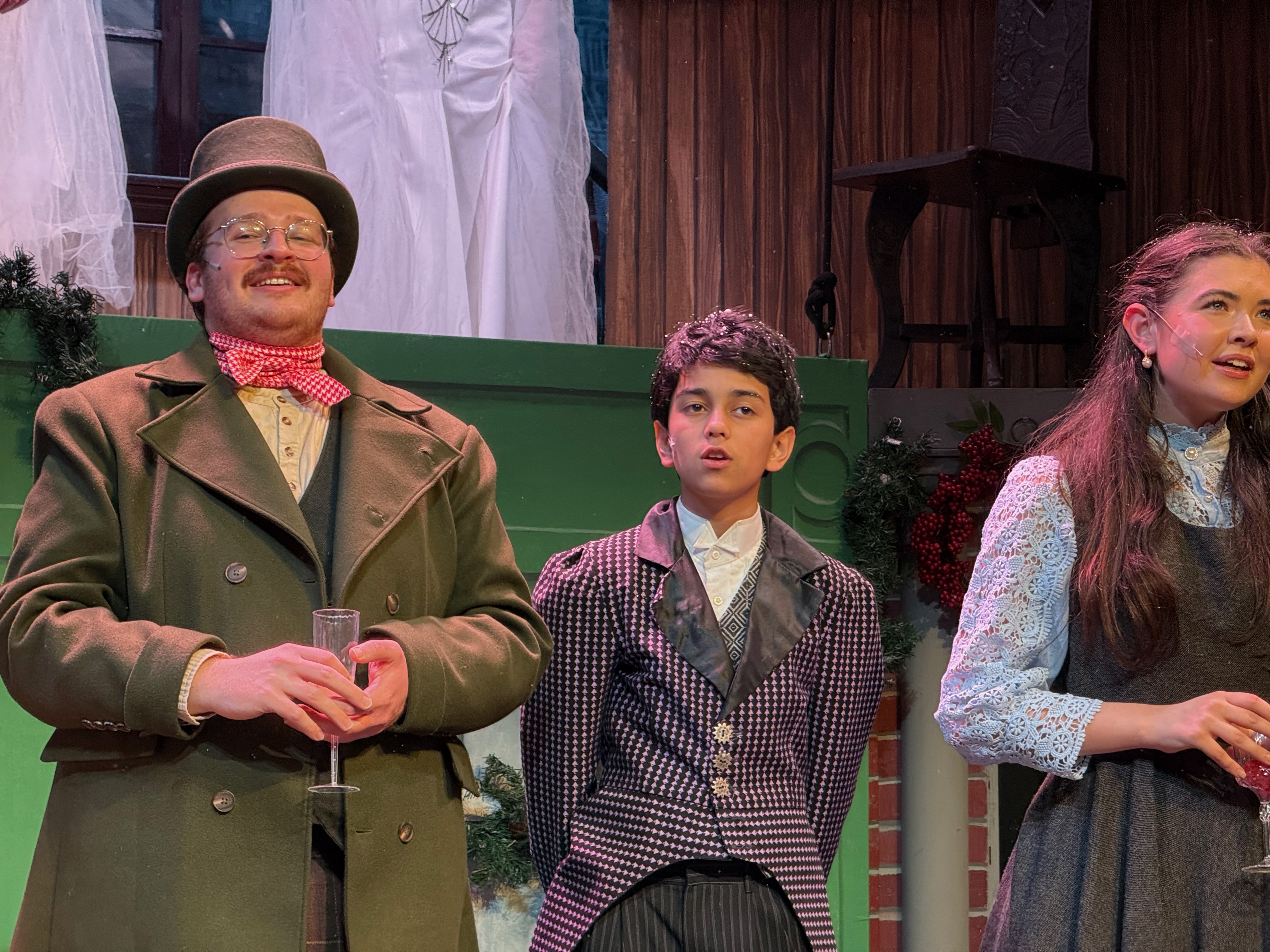 Fitz with cast members Fitz in Victorian costume with two adult actors